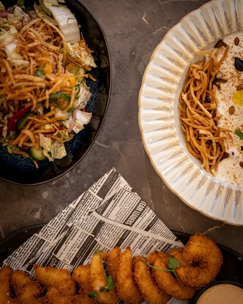 Salad, fatteh and crumbed shrimp from above